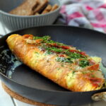Opskrift på den perfekte omelet med parmaskinke og feta